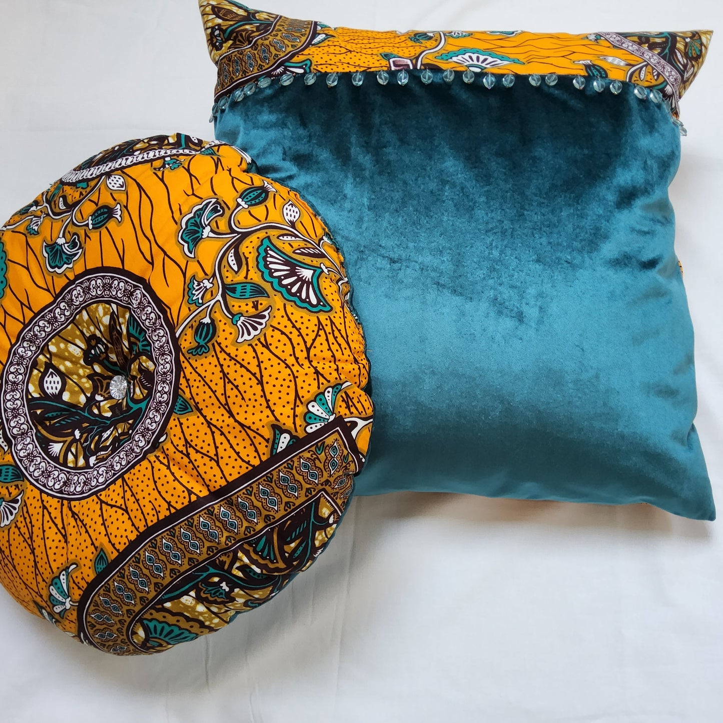 AFRICAN INSPIRED FABRIC + VELVET MIX ROUND CUSHION